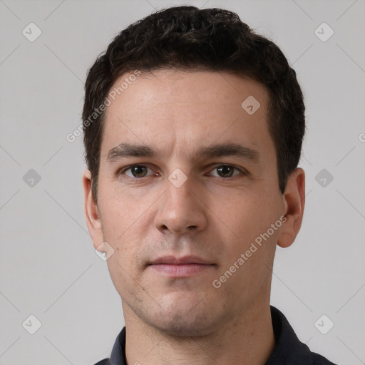 Neutral white young-adult male with short  brown hair and brown eyes