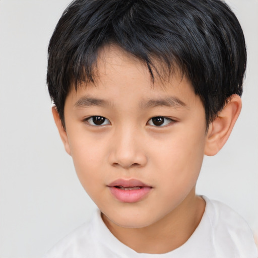 Neutral asian child male with short  brown hair and brown eyes