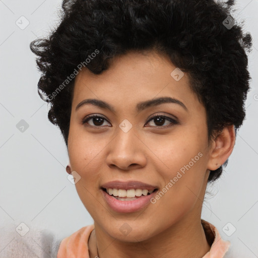 Joyful latino young-adult female with short  brown hair and brown eyes