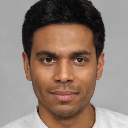Neutral latino young-adult male with short  black hair and brown eyes