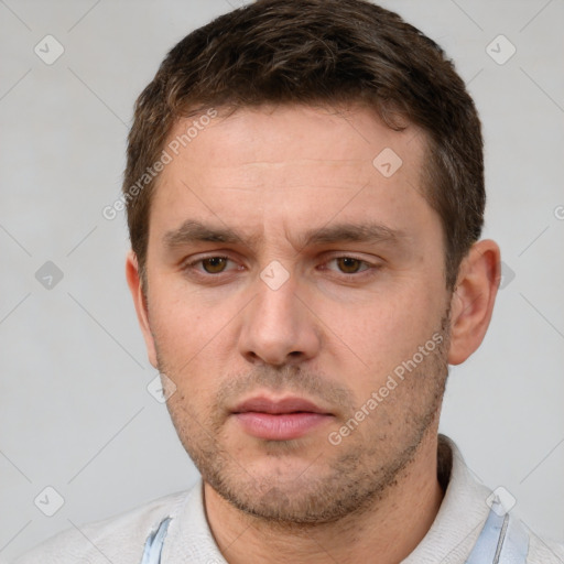 Neutral white young-adult male with short  brown hair and brown eyes