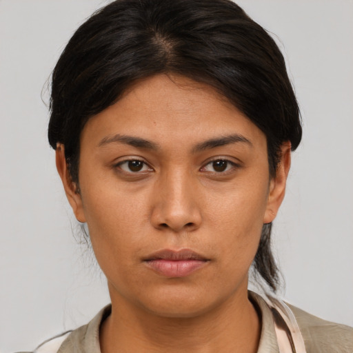 Neutral asian young-adult female with medium  brown hair and brown eyes