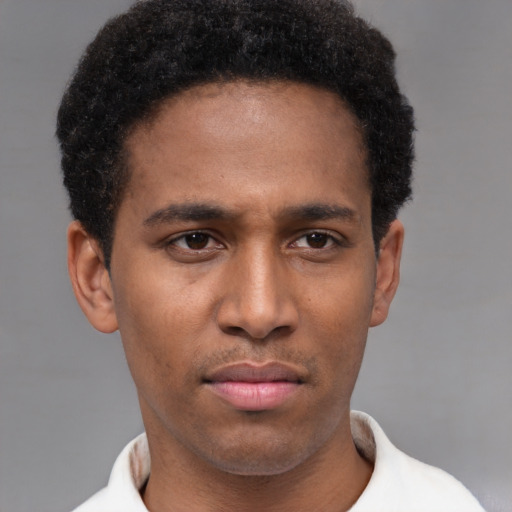 Neutral latino young-adult male with short  brown hair and brown eyes