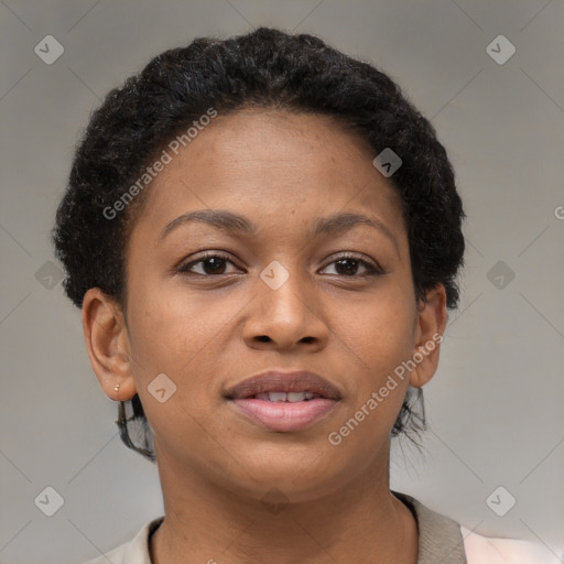 Joyful black young-adult female with short  brown hair and brown eyes