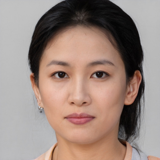 Neutral asian young-adult female with medium  black hair and brown eyes