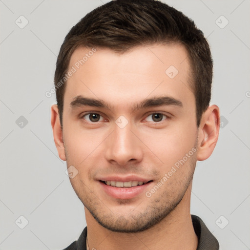 Joyful white young-adult male with short  brown hair and brown eyes