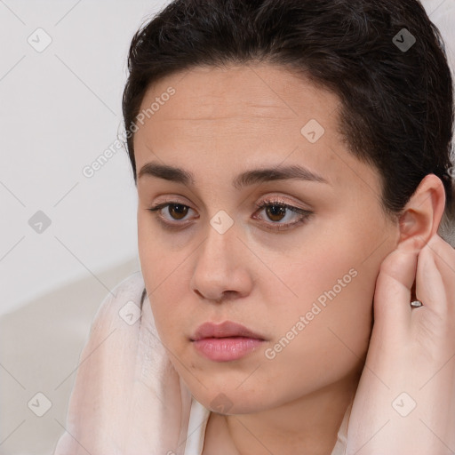 Neutral white young-adult female with medium  brown hair and brown eyes