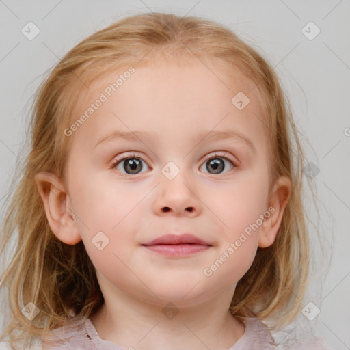 Joyful white child female with medium  brown hair and blue eyes