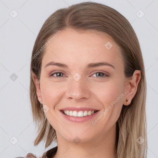 Joyful white young-adult female with long  brown hair and grey eyes