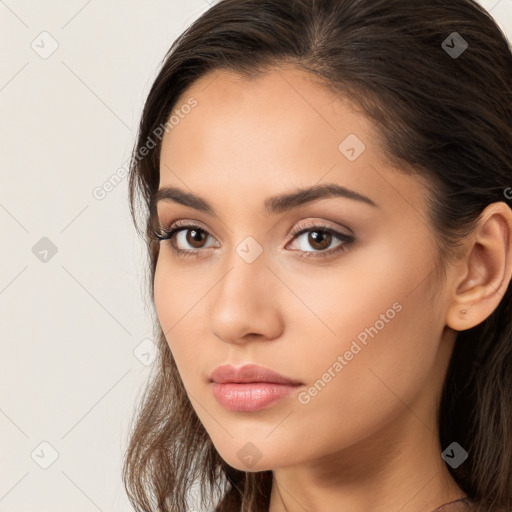 Neutral white young-adult female with long  brown hair and brown eyes