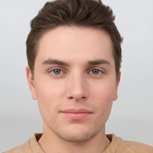 Neutral white young-adult male with short  brown hair and brown eyes