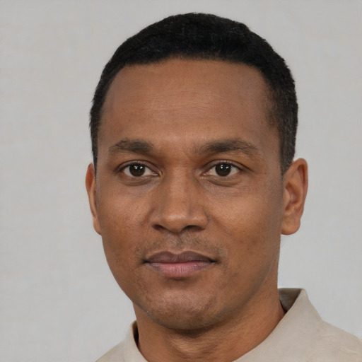 Neutral black young-adult male with short  black hair and brown eyes