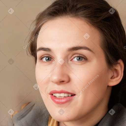 Joyful white young-adult female with long  brown hair and blue eyes