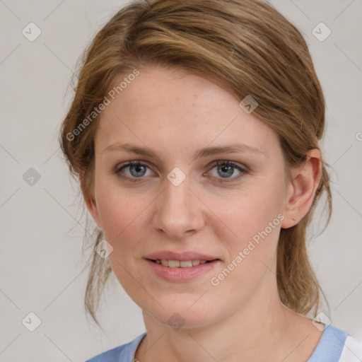 Joyful white young-adult female with medium  brown hair and blue eyes