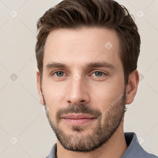 Neutral white young-adult male with short  brown hair and grey eyes