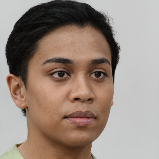 Neutral latino young-adult female with short  brown hair and brown eyes