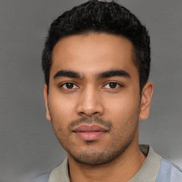 Neutral latino young-adult male with short  black hair and brown eyes