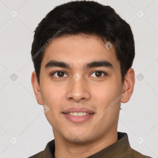 Joyful white young-adult male with short  black hair and brown eyes