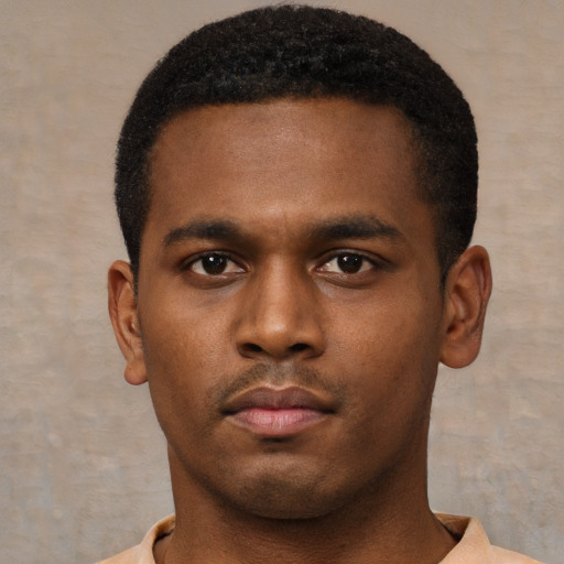 Neutral black young-adult male with short  brown hair and brown eyes
