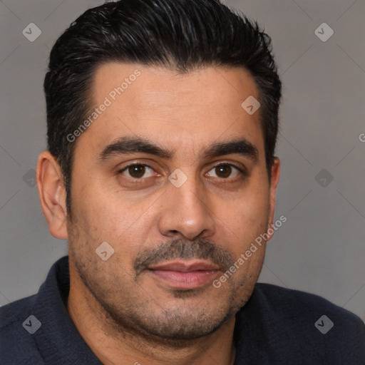 Joyful white adult male with short  brown hair and brown eyes