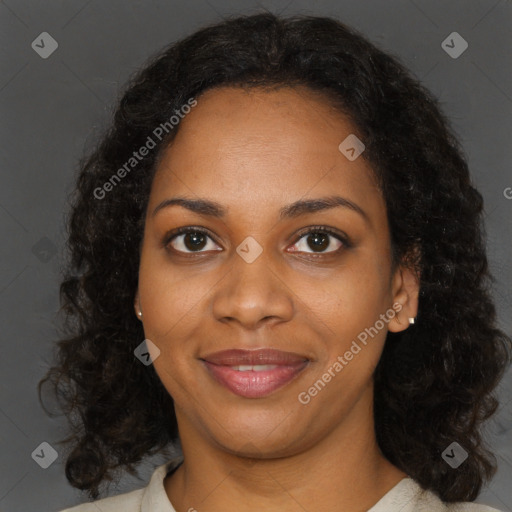 Joyful black young-adult female with medium  brown hair and brown eyes