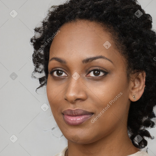 Joyful black young-adult female with medium  black hair and brown eyes