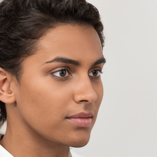 Neutral white young-adult female with short  brown hair and brown eyes