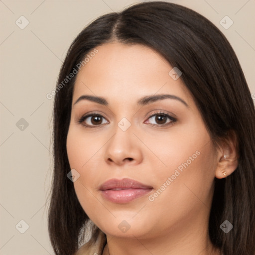 Joyful latino young-adult female with long  brown hair and brown eyes