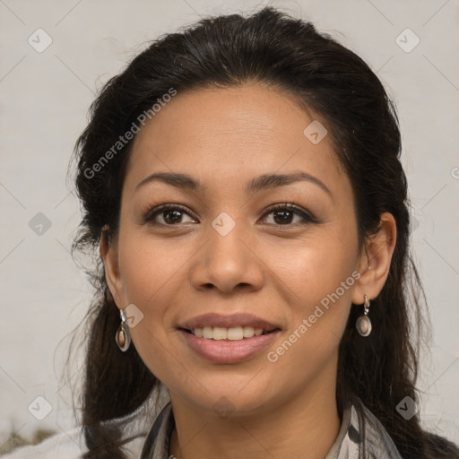 Joyful latino young-adult female with medium  brown hair and brown eyes