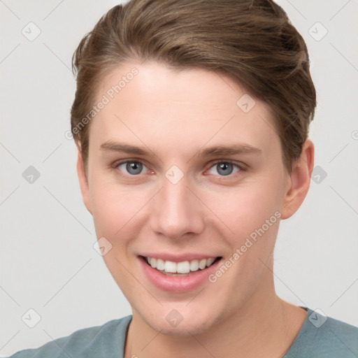 Joyful white young-adult female with short  brown hair and grey eyes