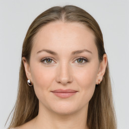 Joyful white young-adult female with long  brown hair and grey eyes