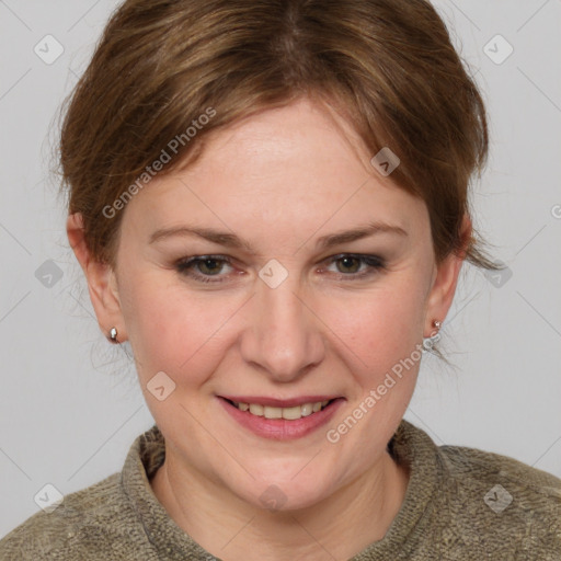 Joyful white young-adult female with medium  brown hair and blue eyes