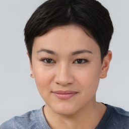 Joyful asian young-adult female with short  brown hair and brown eyes