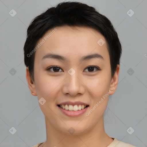 Joyful asian young-adult female with short  black hair and brown eyes