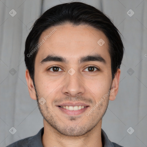 Joyful white young-adult male with short  black hair and brown eyes