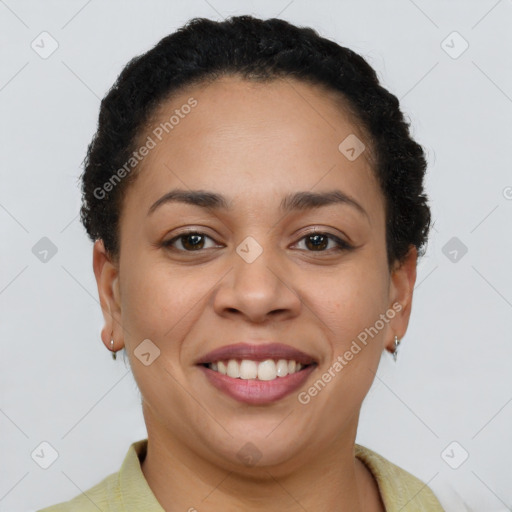 Joyful latino young-adult female with short  brown hair and brown eyes