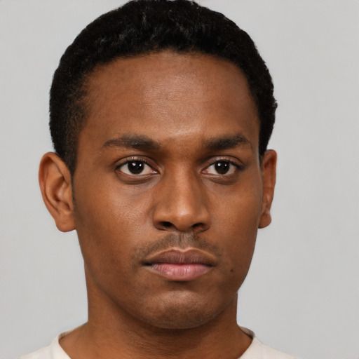 Neutral black young-adult male with short  black hair and brown eyes