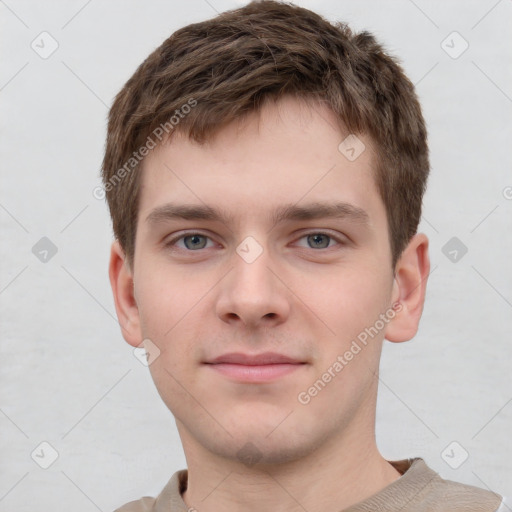 Neutral white young-adult male with short  brown hair and grey eyes