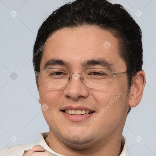 Joyful white adult male with short  brown hair and brown eyes