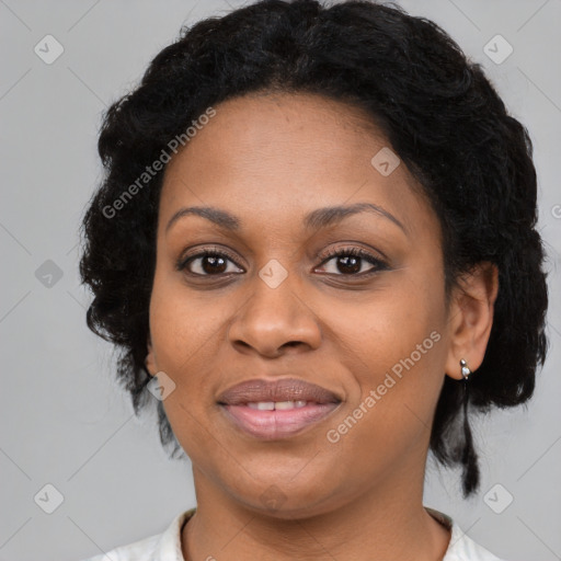 Joyful black young-adult female with medium  black hair and brown eyes