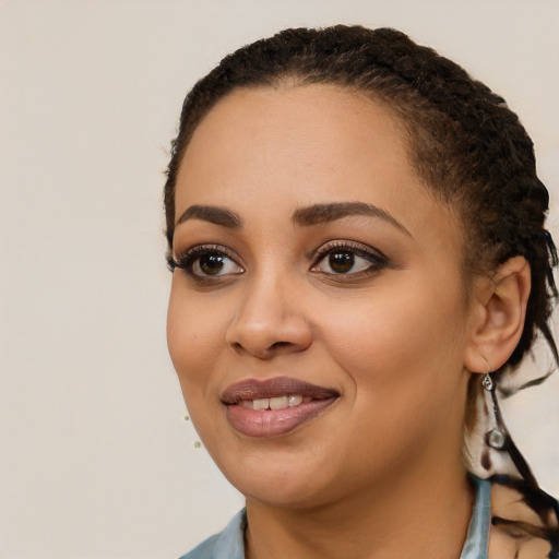 Joyful latino young-adult female with short  black hair and brown eyes