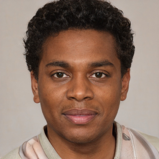 Neutral black young-adult male with short  brown hair and brown eyes