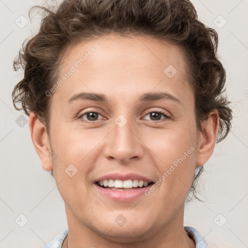 Joyful white young-adult female with short  brown hair and grey eyes