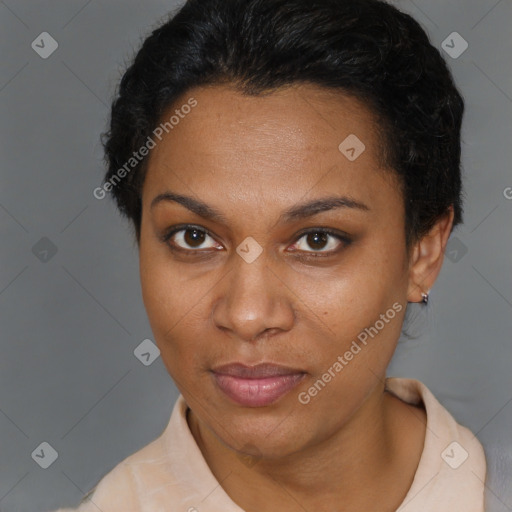 Joyful black adult female with short  brown hair and brown eyes