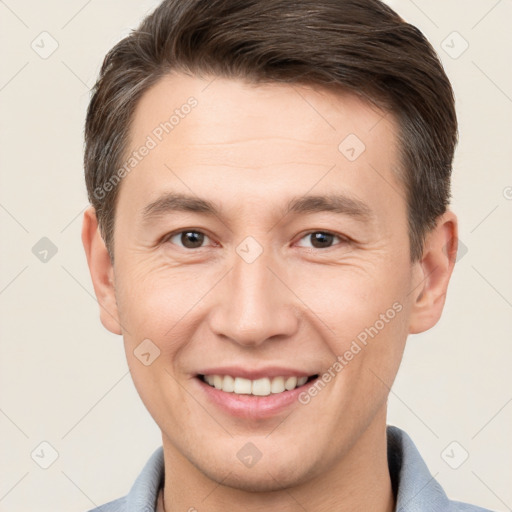 Joyful white young-adult male with short  brown hair and brown eyes