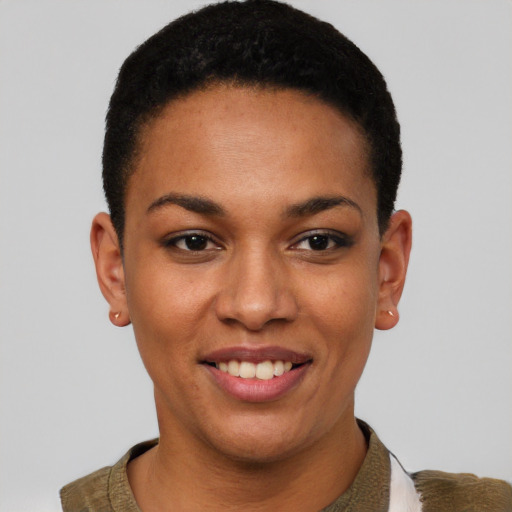 Joyful black young-adult female with short  brown hair and brown eyes