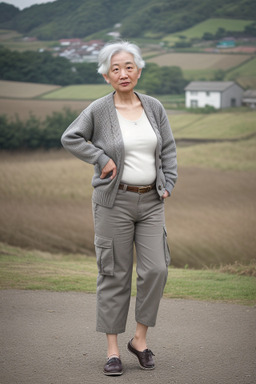 Taiwanese 45 years non-binary with  gray hair