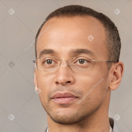 Joyful white adult male with short  brown hair and brown eyes