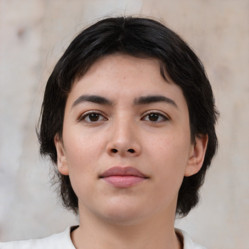 Neutral white young-adult female with medium  black hair and brown eyes