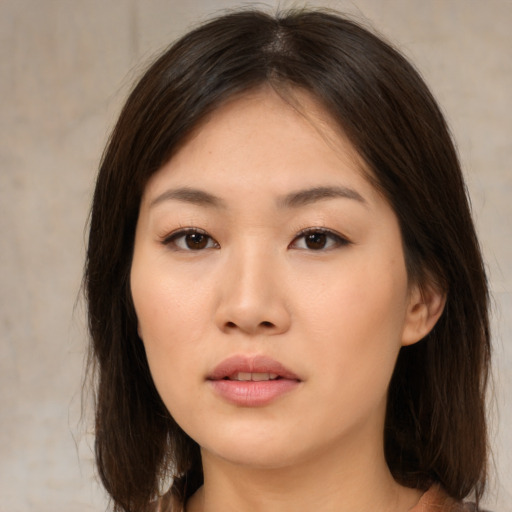 Neutral asian young-adult female with medium  brown hair and brown eyes